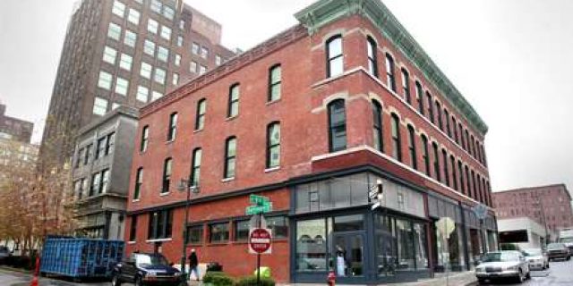 DOWNTOWN DEVELOPMENT 

New tenants are opening on the first floor of the former Cosby Hotel at 105 W. Ninth St.